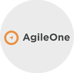 The image shows the AgileOne logo. The logo comprises the word "AgileOne" in gray text with a small, orange, compass-like symbol to the left of the word. The logo's background is grayish-white.