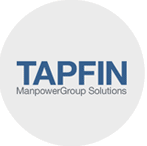 The image is a logo for TAPFIN, a division of ManpowerGroup Solutions. The word "TAPFIN" is displayed in bold blue letters, and directly below it, the text "ManpowerGroup Solutions" is written in gray. The logo is set against a circular light gray background.