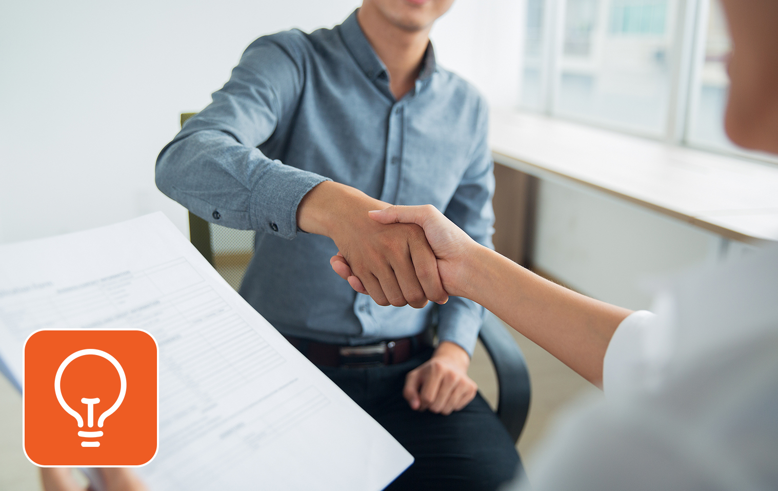 Two people shaking hands