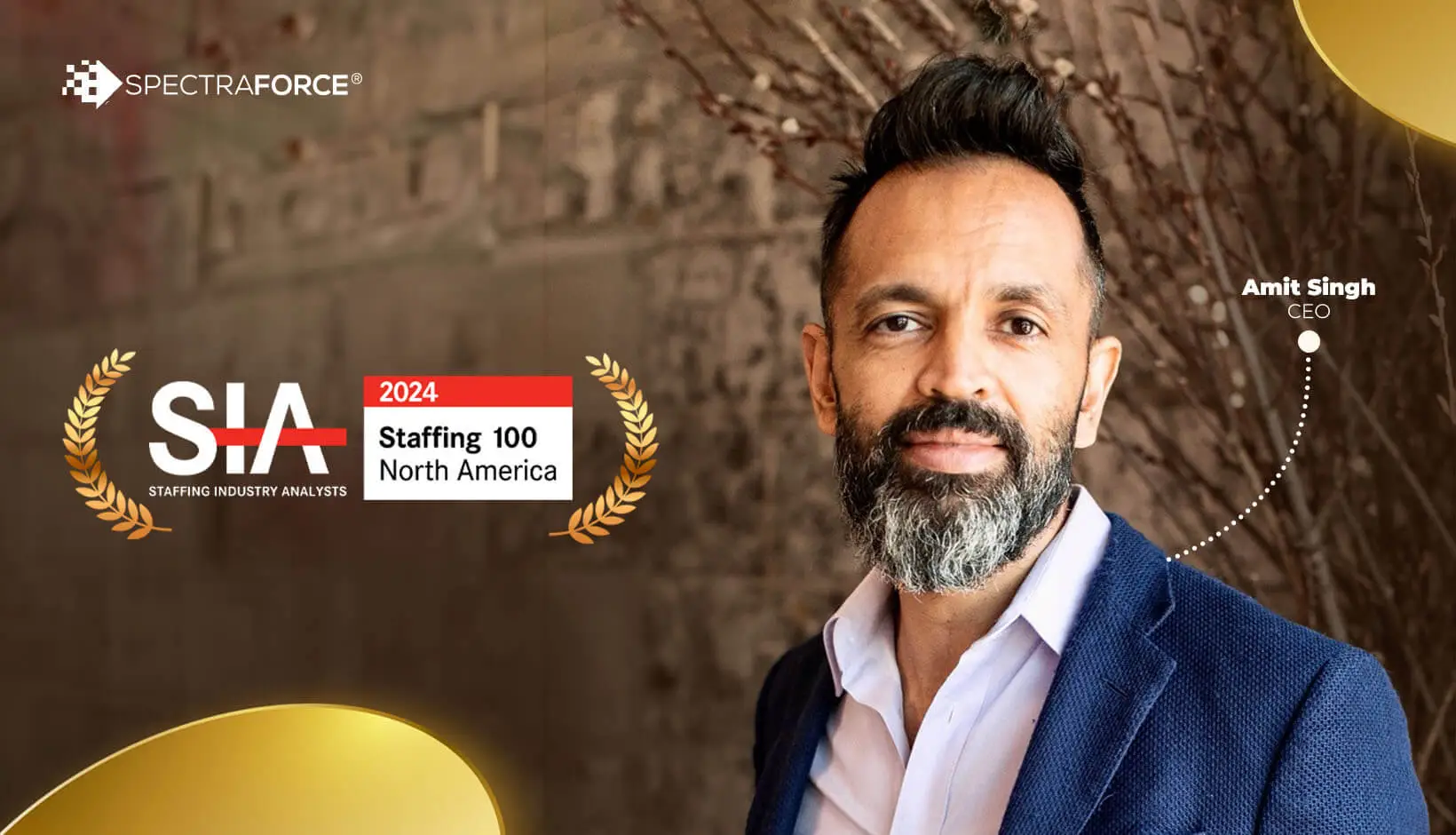 Amit Singh, CEO of SPECTRAFORCE, standing before a stylish backdrop, highlighting 2024 Staffing 100 North America recognition.