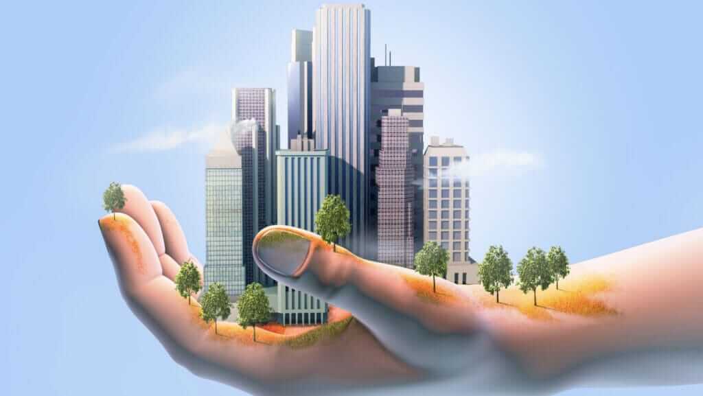 A digital illustration of a hand holding a small cityscape of skyscrapers and buildings, symbolizing the mastery one can gain from training courses. Trees are interspersed among the buildings and also appear on the fingers and palm of the hand, set against a clear blue sky.