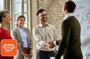 Managers happily shaking hands with the newly hired teammate